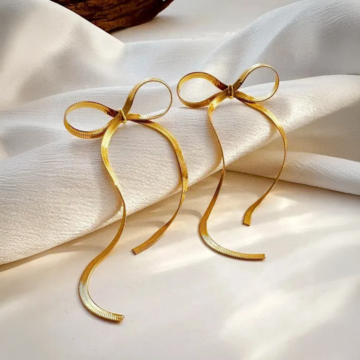Sarella | Orecchini con Nodo e Catena a Serpente Dorata