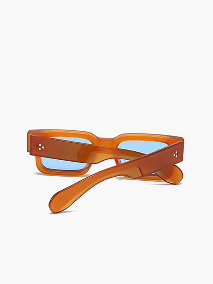 Occhiali da sole, montatura trasparente color ambra con lenti blu, acetato, Donna